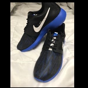 Nike blue/black/white athletic shoes. Brand New
